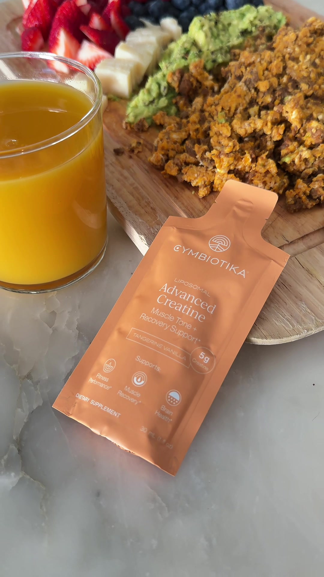 TikTok post by @krsna.garr for Cymbiotika. Caption reads: [...] By supporting ATP and overall energy,....