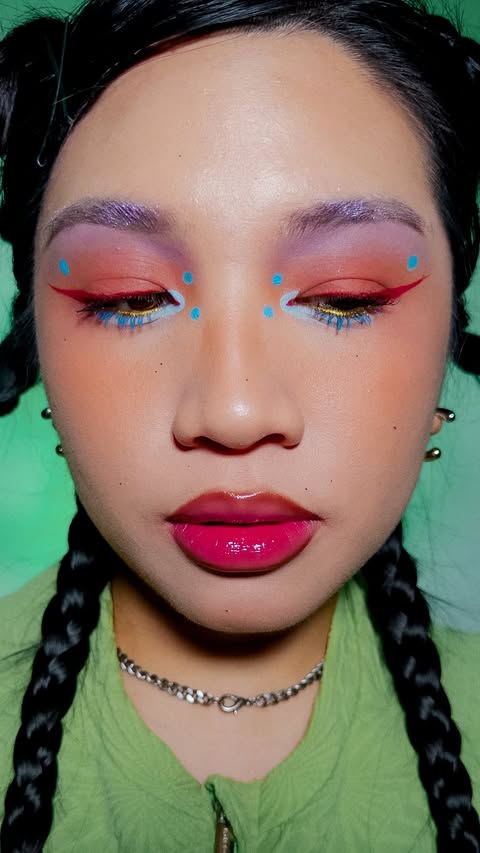 Instagram post by @cosmicchiko for About-face Beauty. Caption reads: @aboutfacebeauty Matte Fluid Eye Paints in action....