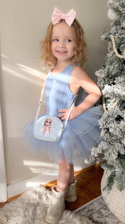 Instagram post by @jessica.mcdanie.l for iloveplum. Caption reads: @plumnyc tutu of the day ❄️ Shop all of our....