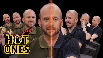 YouTube post by @FirstWeFeast for First We Feast. Caption reads: Sean Evans Interviews Himself While Eating Spicy....