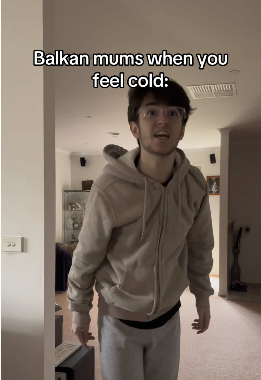 TikTok post by @thepetardimovski for The Oodie. Caption reads: Balkan mums when you feel cold: Click the link in....