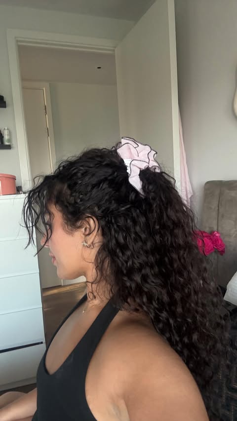 Instagram post by @issraissry for CURLSMITH. Caption reads: [...] It’s a curls world with the new....