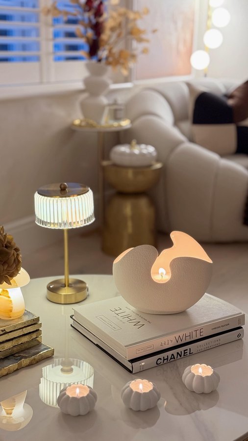 Instagram post by @our.kent.home for Candlera Candle. Caption reads: [...] sand candle is, and the vase from....