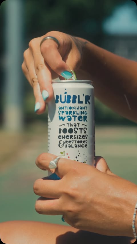 Instagram post by @charliefuerbringer for BUBBL'R. Caption reads: @drinkbubblr #BUBBLRPartner #BubblesWithBenefits.
