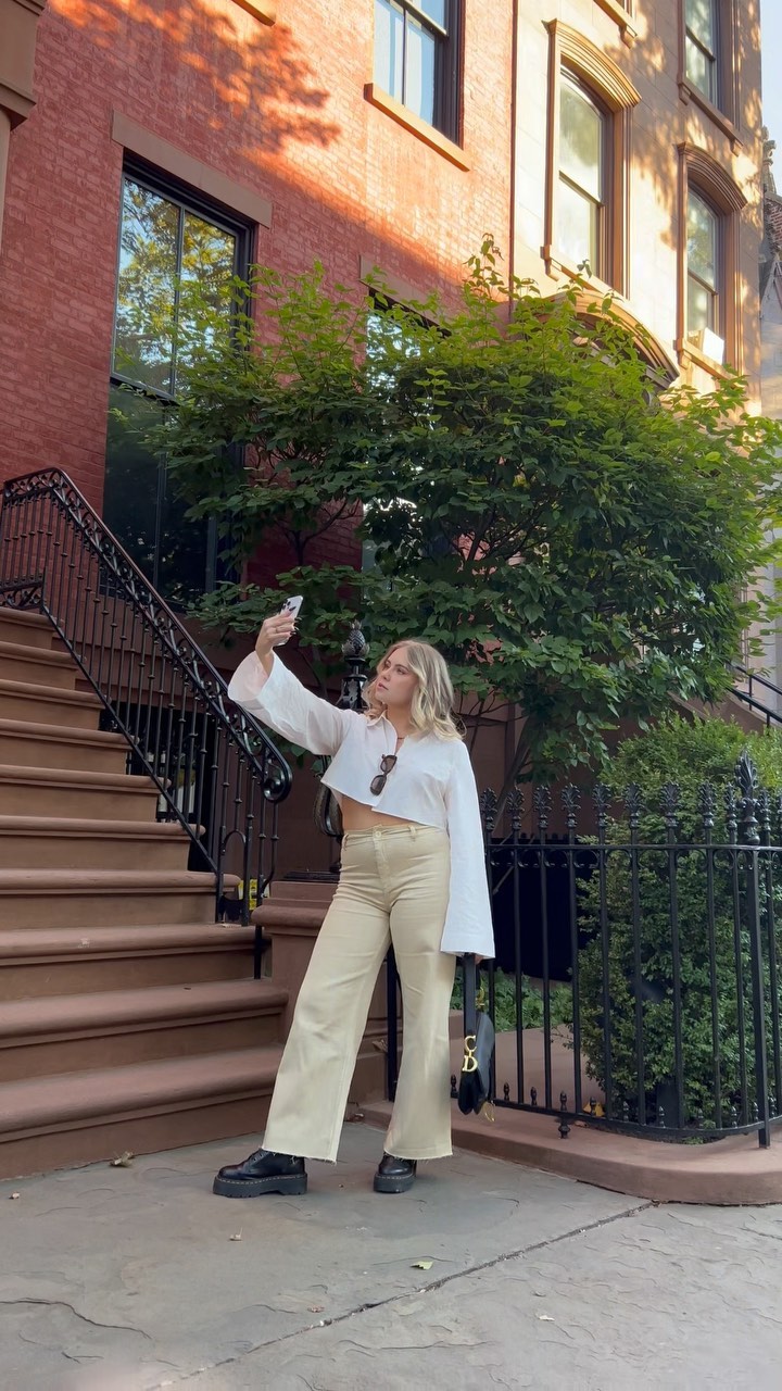 Instagram post by @lexierobertson_ for InfluenceHer Collective. Caption reads: a perfect fall day in a perfect fall fit🍂🎃

find....