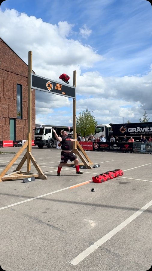 Instagram post by @jhsz_peti for – Cerberus Strength. Caption reads: Bag toss medley on 2nd place at SCL....