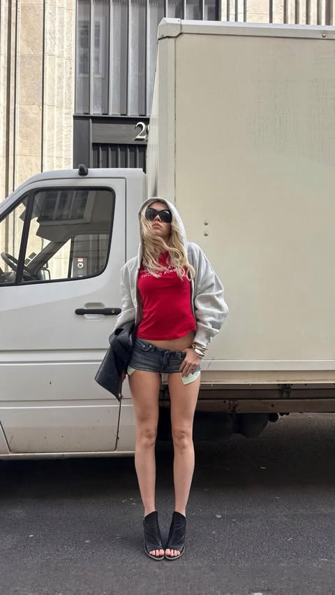 Instagram post by @girlcalledluca for WEEKDAY. Caption reads: #ad @weekdayofficial The walk hits different when....