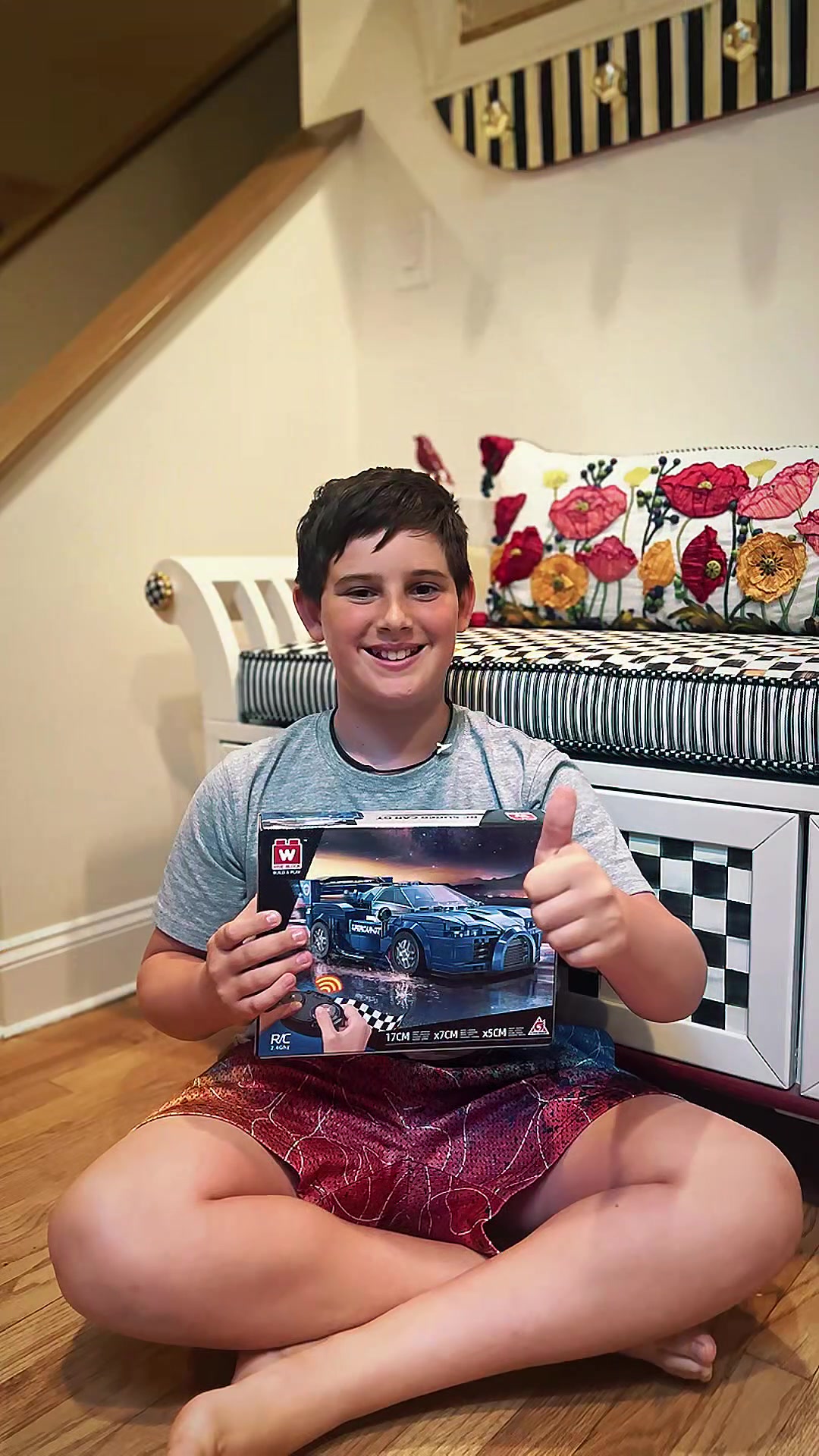 TikTok post by @smileswmyles for Alpha Toys. Caption reads: 🎉 Vroom Vroom! Check out the Wise Block Build and....