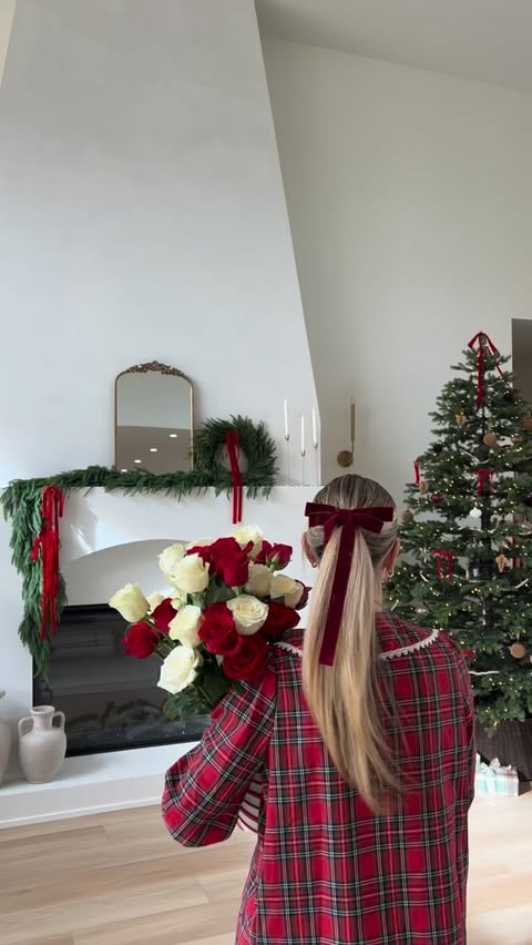 Instagram post by @ella.ignatov for 1800Flowers. Caption reads: #ad Decorating cookies in our Christmas PJs with....