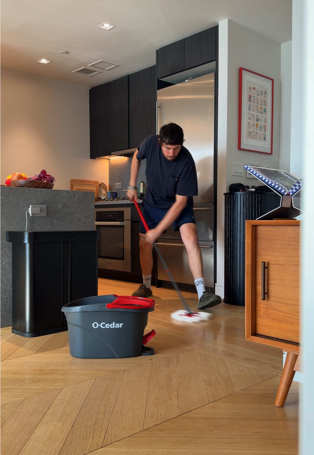 TikTok post by @adrianvvlogs for O-Cedar. Caption reads: #ad O-Cedar makes it easy to take good care of the....