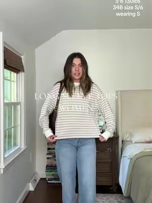 TikTok post by @readthepage for nuuds. Caption reads: This nuuds long sleeve shirt >> #longsleeveshirt....