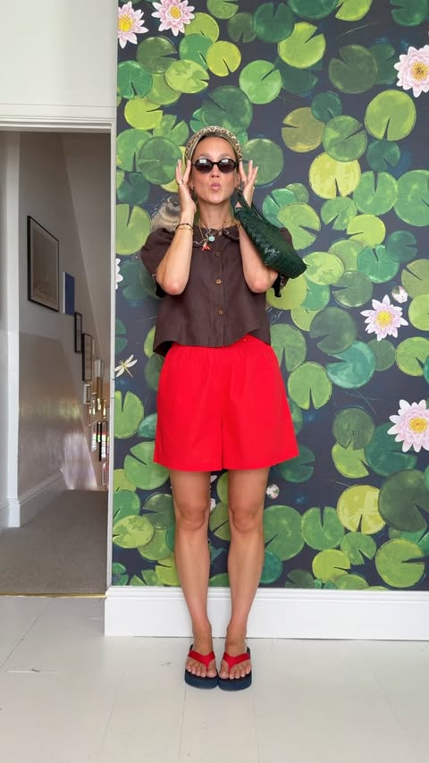 Instagram post by @goodmannersstyle for Tu Clothing. Caption reads: Styling these mega red shorts that were £14 ❤️....