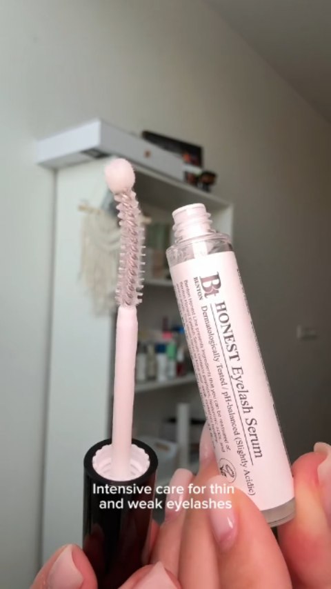 Instagram post by @ella__lens__ugc for OLIVE YOUNG. Caption reads: I love Benton honest eyelash serum. My lashes feel....