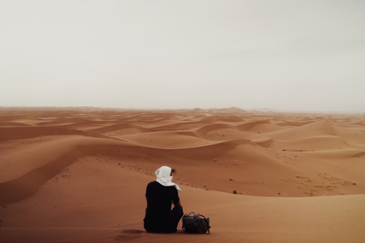 Instagram post by @justkay for ASUS. Caption reads: Incredible moments from the Sahara 🎬 I spent five....