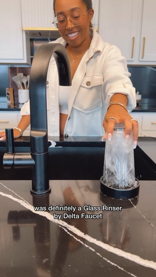 Instagram post by @kaylasimonehome for Delta Faucet. Caption reads: diy plumbing 🤝 nesting #ad our new Glass Rinser....