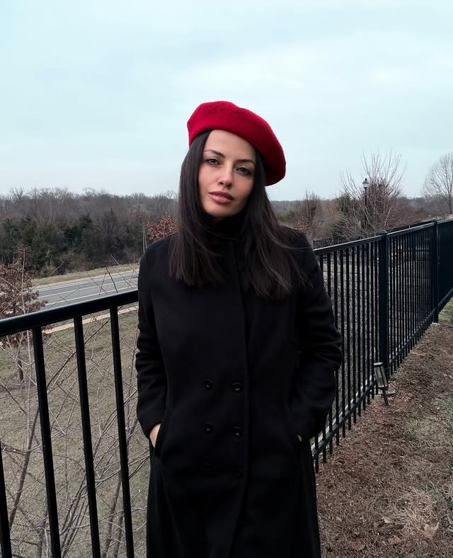 Instagram post by @merhabaamericaa for JardinVue. Caption reads: My black coat is a timeless staple🖤 @jardinvue....