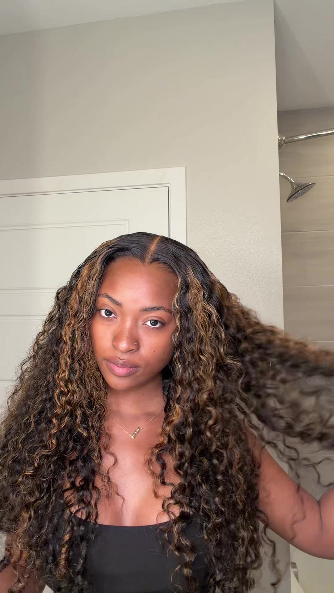 TikTok post by @xoalyria for Amanda Hair. Caption reads: [...] Burmese curly Glueless wig from @amandahair....