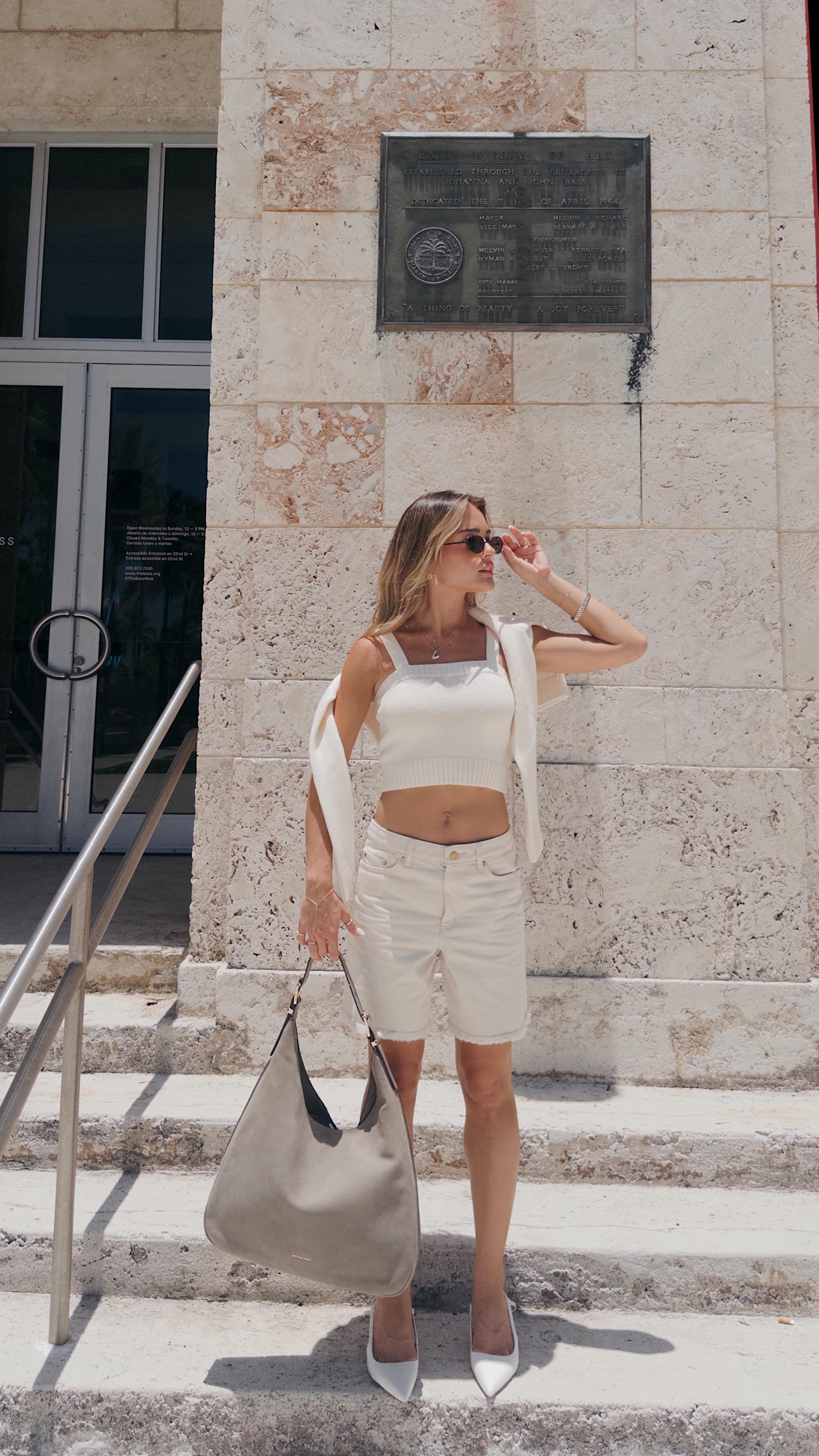 Instagram post by @valegenta for Michael Kors. Caption reads: Nothing says summer like a monochromatic cream....