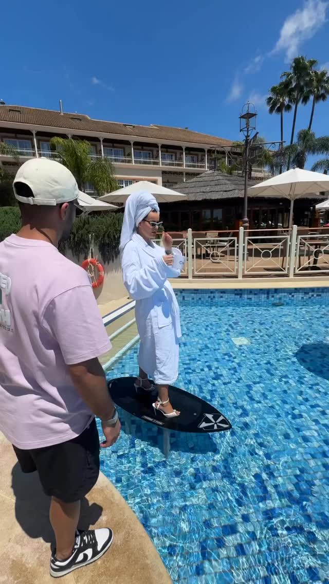 Instagram post by @boss_baby001k for Sportsbet.io. Caption reads: BTS 🎥 Surfing 🏄‍♀️ in the swimming pool with....