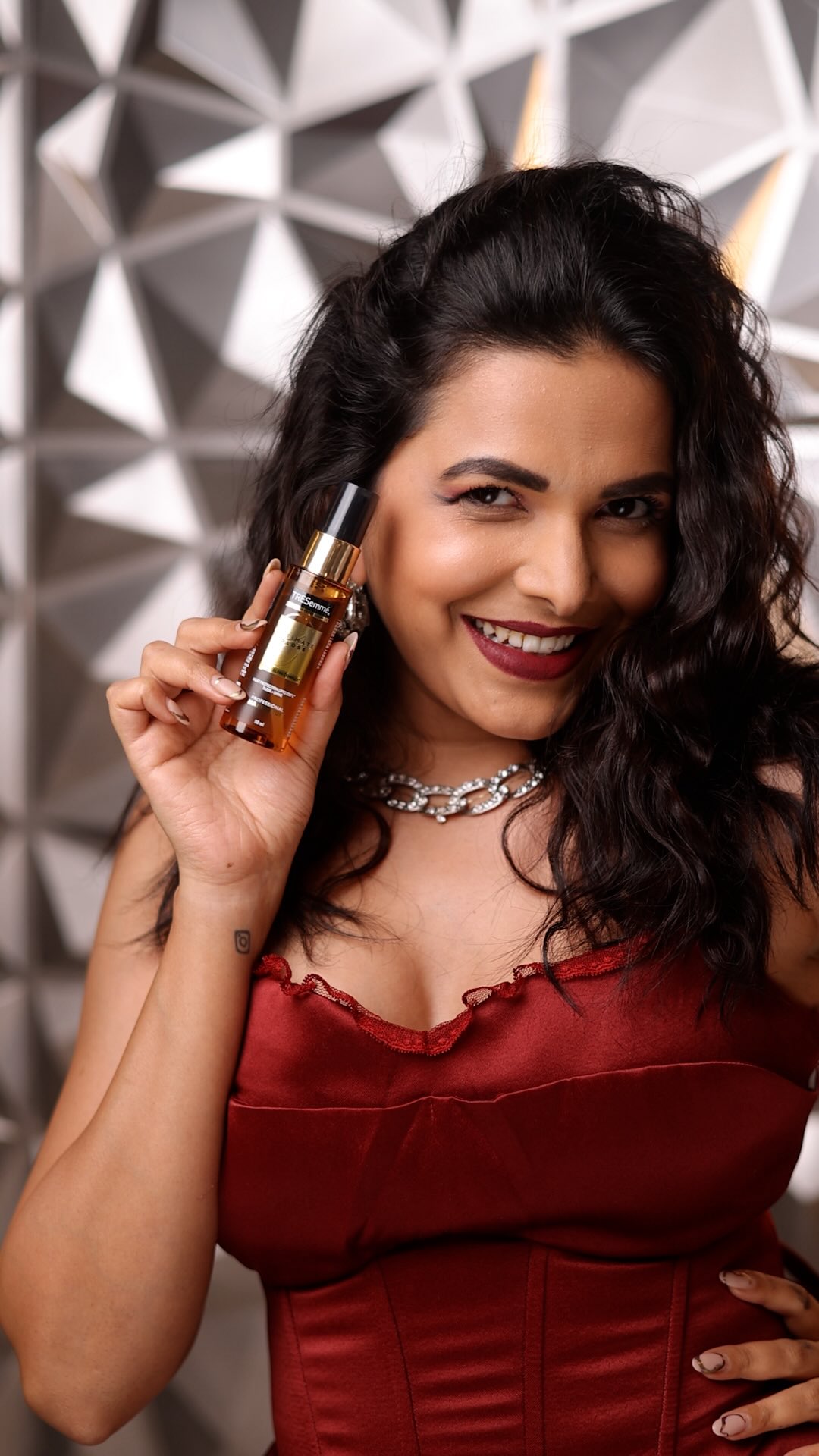 Instagram post by @mitalimayekar for TRESemmé. Caption reads: Shine is cute, but Gloss? Gloss is the whole mood....