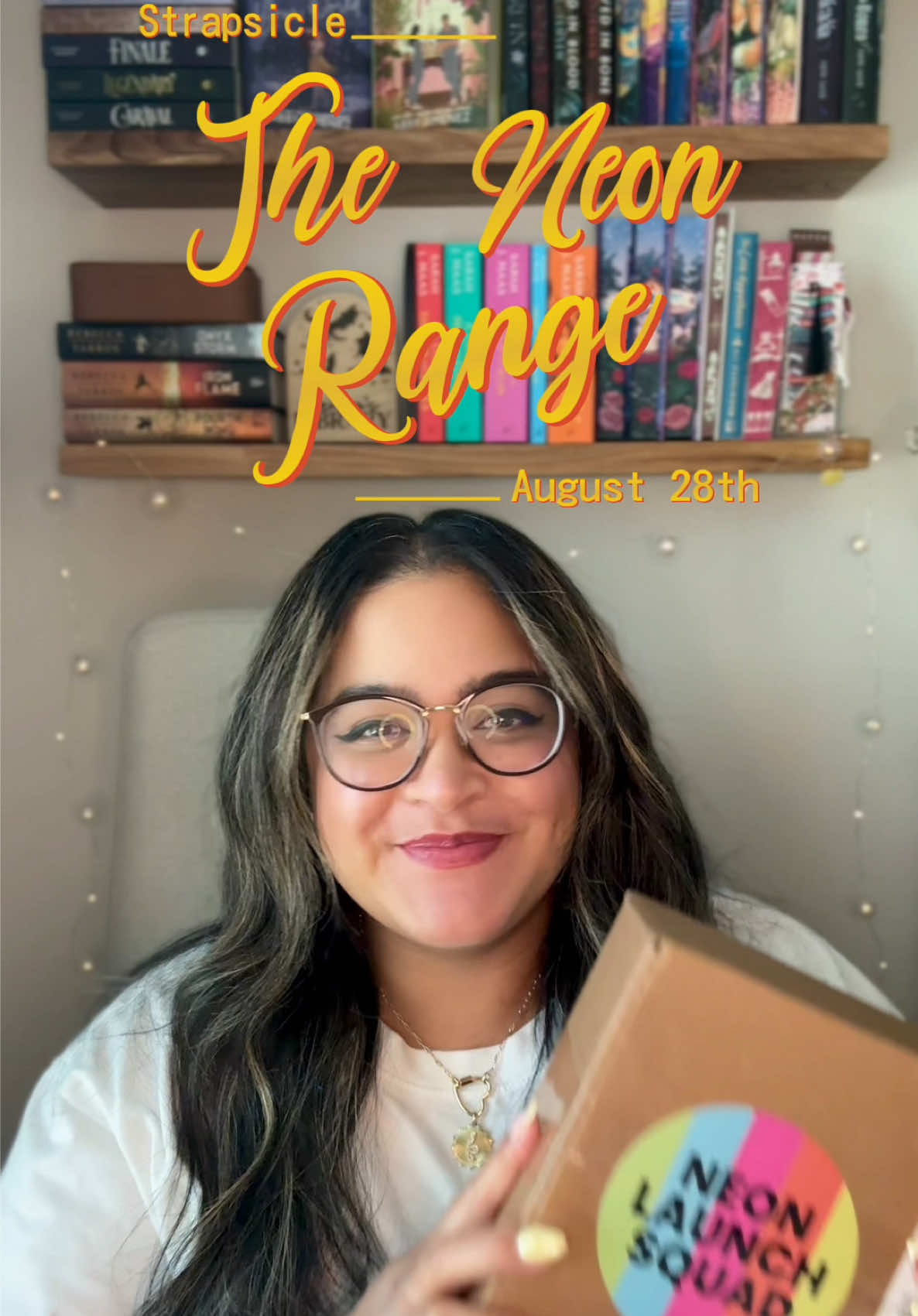 TikTok post by @jennasreadinghaven for Strapsicle. Caption reads: Loving this neon moment! I love my strapsicle....