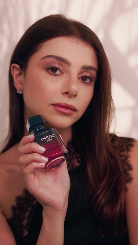 Instagram post by @maritta for Givenchy Beauty. Caption reads: [...] scent, L’Interdit Elixir by Givenchy Beauty....