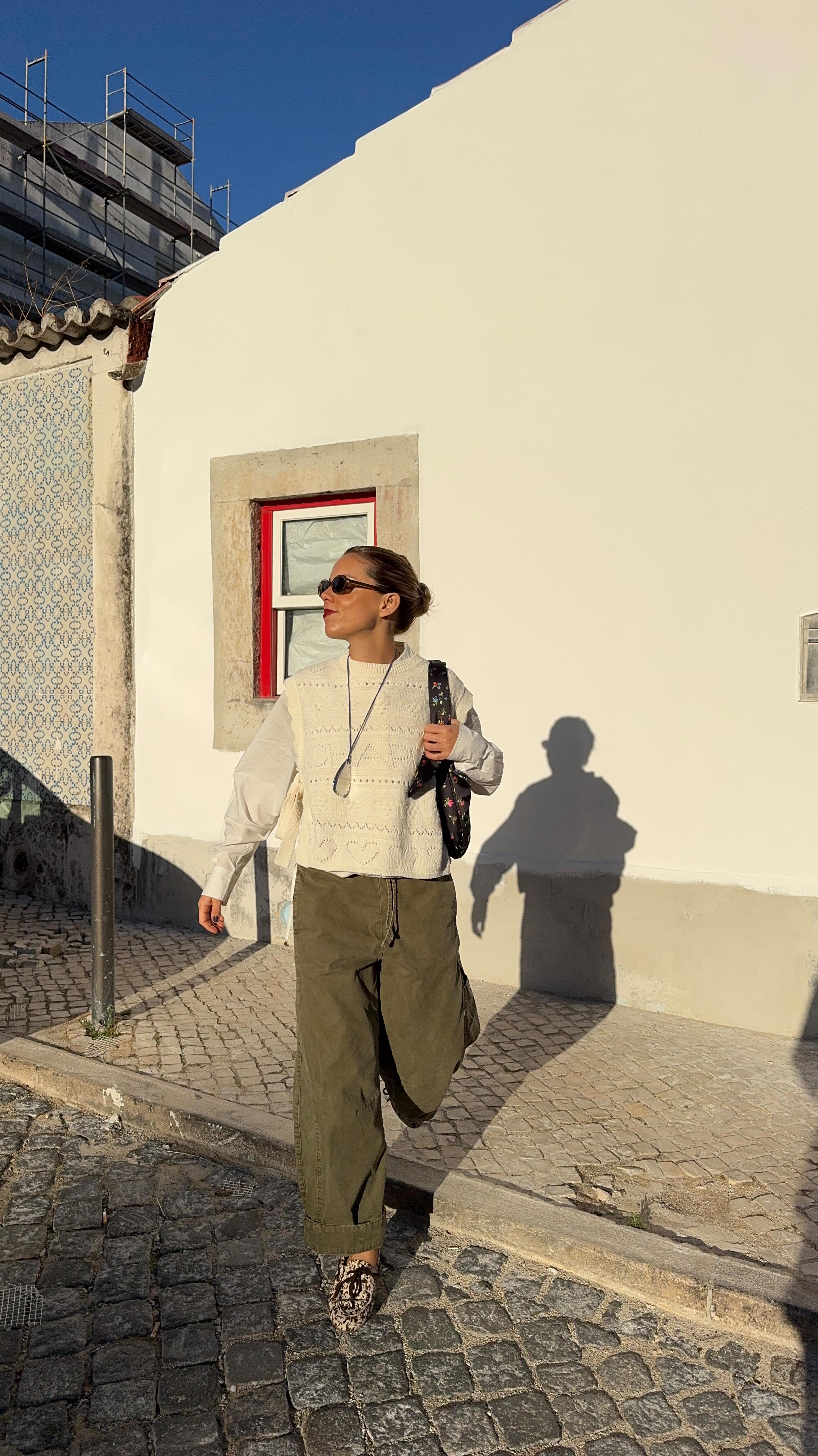 Instagram post by @raquelestevens for JW ANDERSON. Caption reads: Seasons change - but polka dots, suede and La vie....