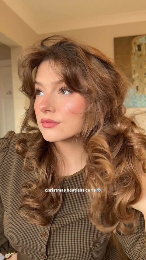 Instagram post by @sashalilliee for Living Proof. Caption reads: christmas day overnight blowout curls....