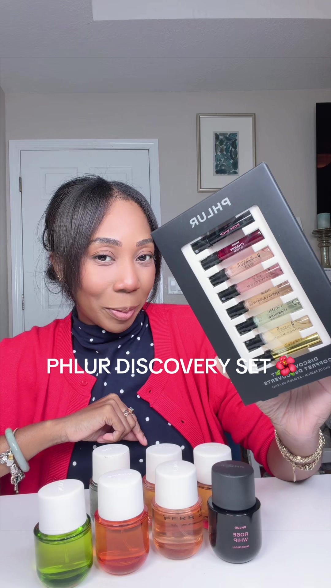 TikTok post by an influencer for Phlur Fragrances. Caption reads: @Phlur Fragrances NEW Discovery Set 🌺 [...].