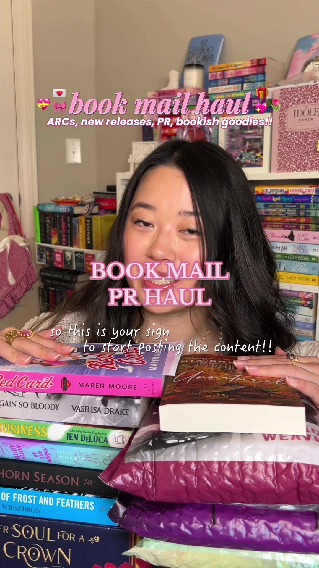 TikTok post by @susancarolynn for Epic Reads. Caption reads: a book mail + pr haul!! 🎀✨📚 cannot WAIT to add....