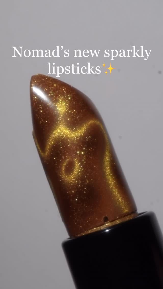 Instagram post by @glamsmitty for Nomad Cosmetics. Caption reads: Nomad’s new sparkly lipsticks✨

The aesthetics on....