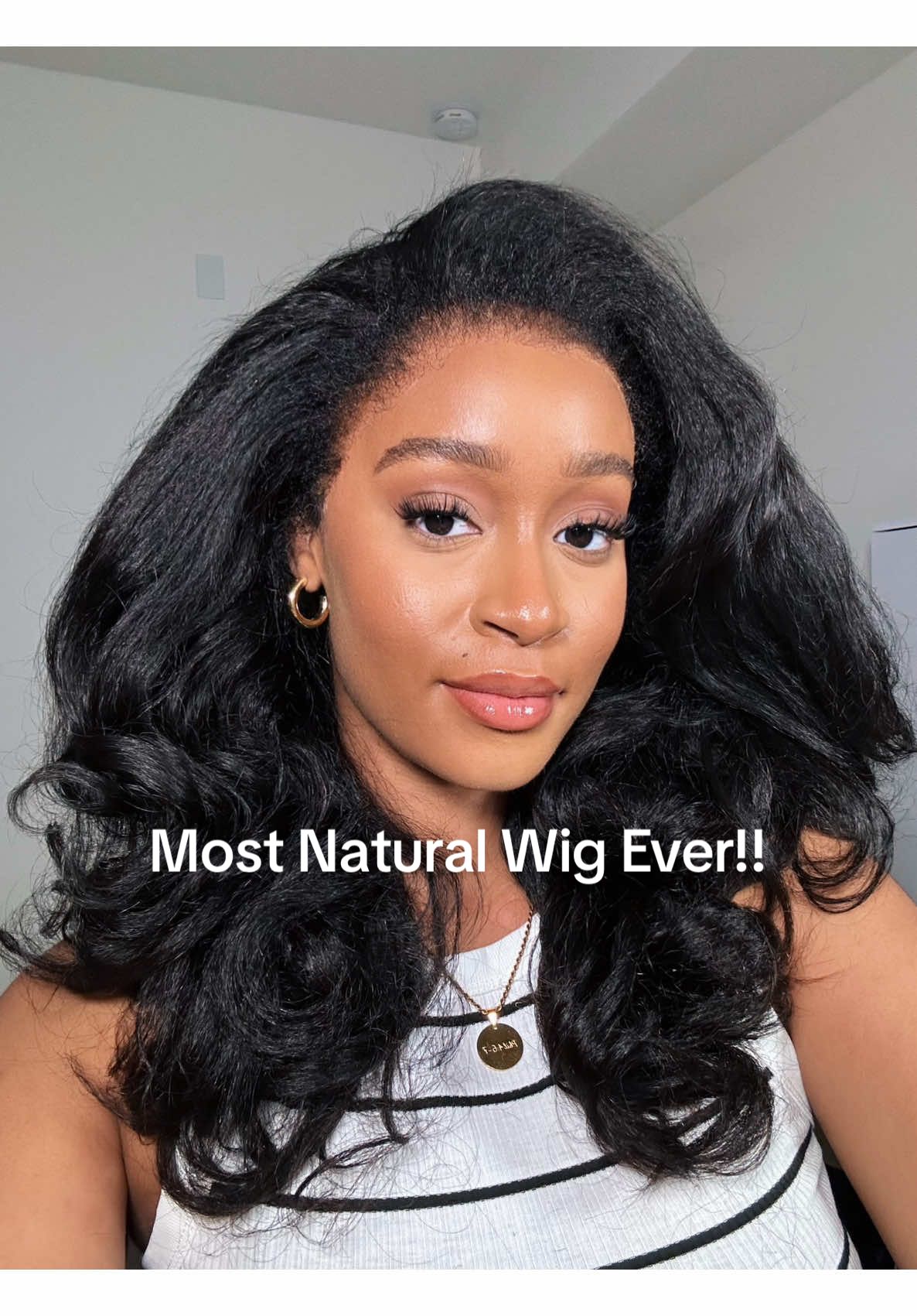 TikTok post by @dailydoseofshaz_ for Ebin New York. Caption reads: [...] Unit from @ILIKEHAIR 😍 Lace spray @EBIN NEW....