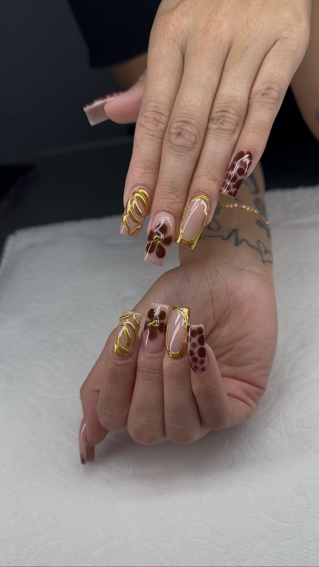 Instagram post by @esme25sz for BeetlesGelPolish. Caption reads: Fall nails with blooming gel 🤎 @beetlesgelpolish ....