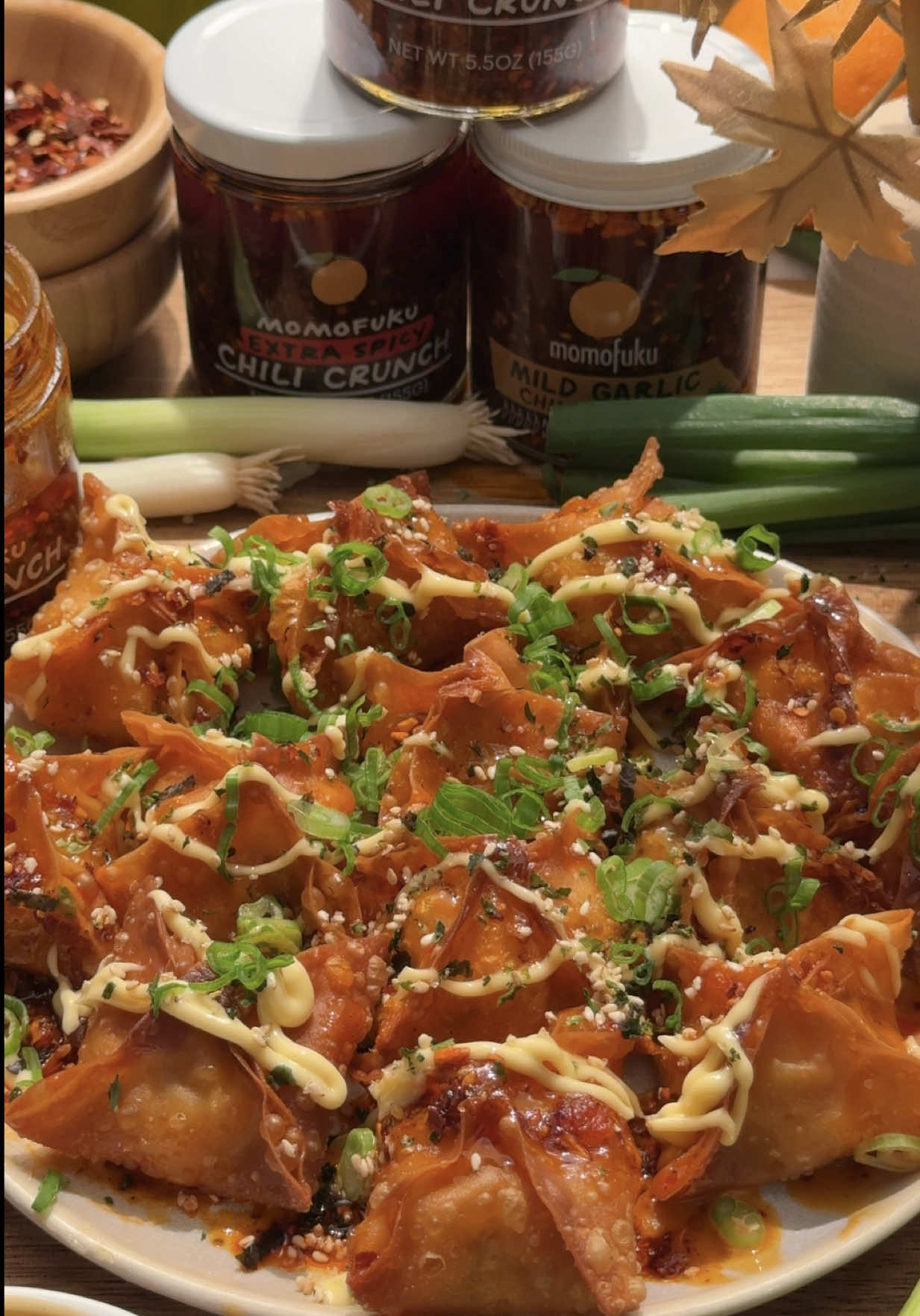 TikTok post by @maryc.129 for Momofuku. Caption reads: @Momofuku Chili Crunch Sushi Dip Rangoon Style....