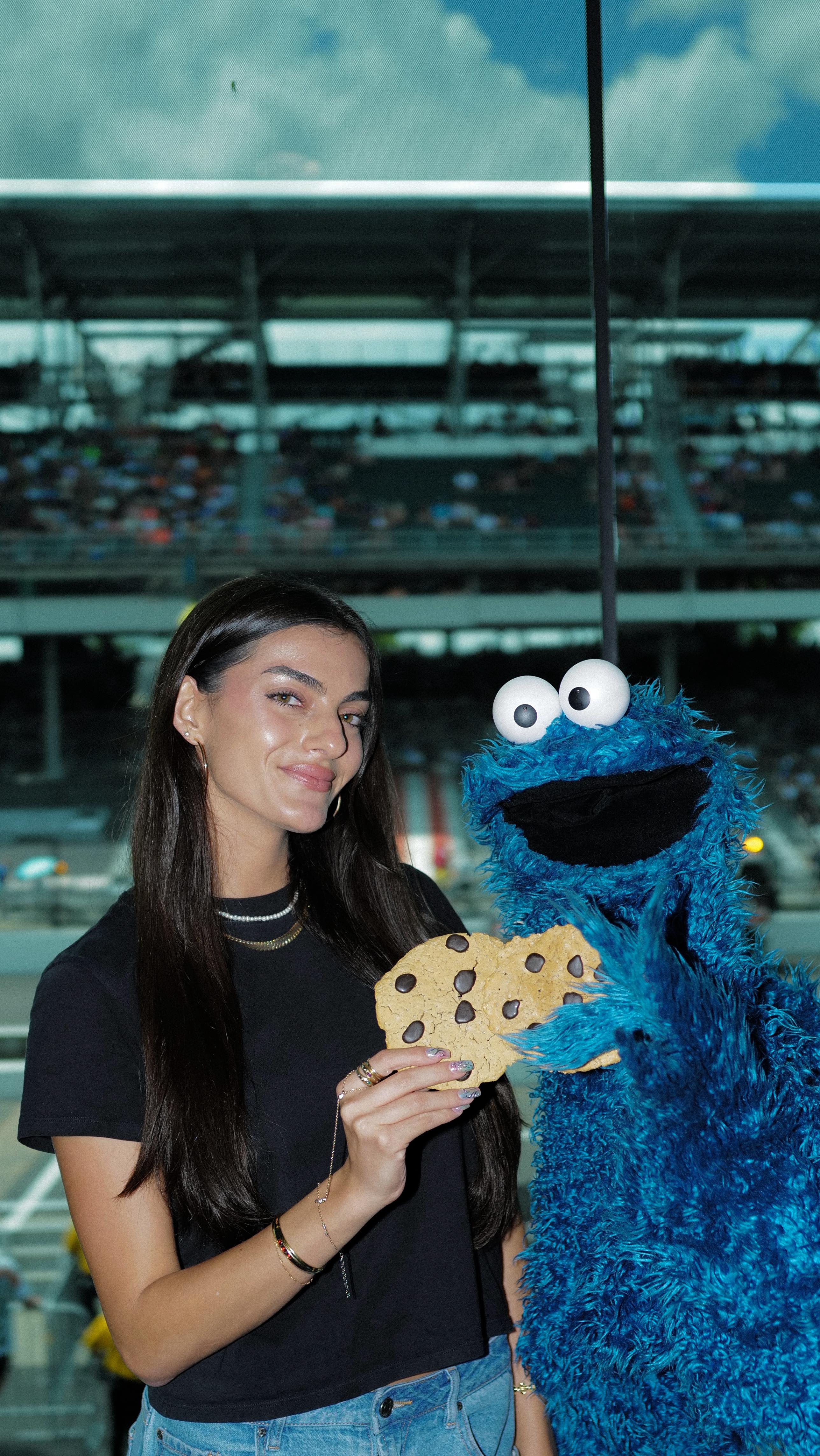 Instagram post by @cookiemonster for Sesame Street. Caption reads: I am here to help, @cookiemonster!🍪🤝....