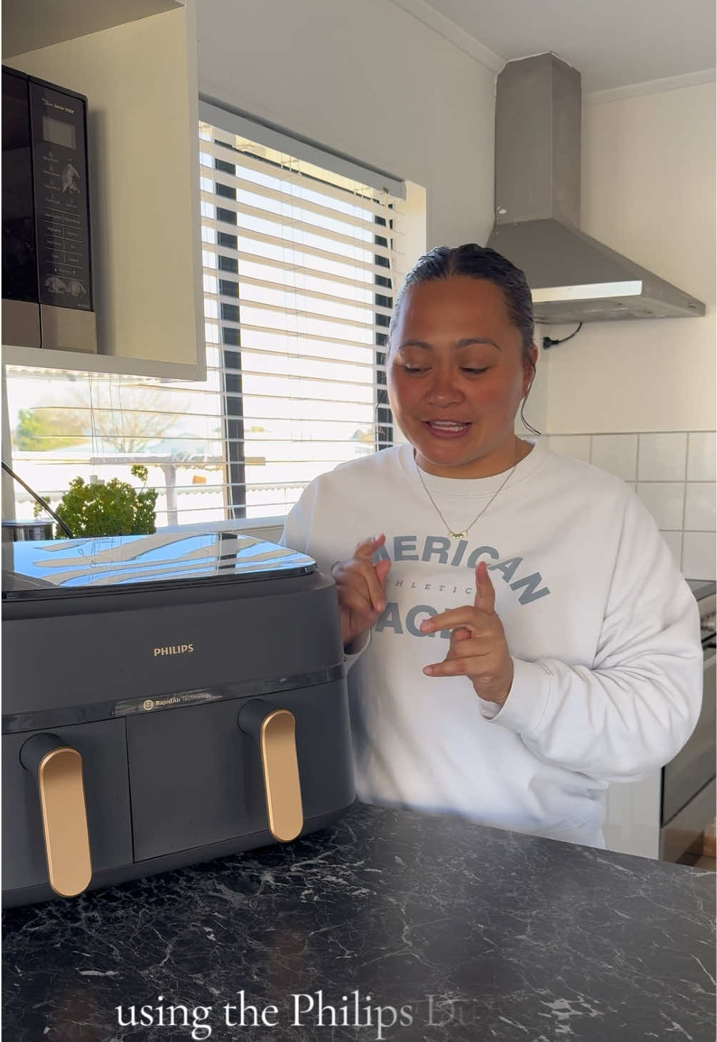 TikTok post by @tori_r for Philips. Caption reads: I love a crispy garlic bread, and kids love a....