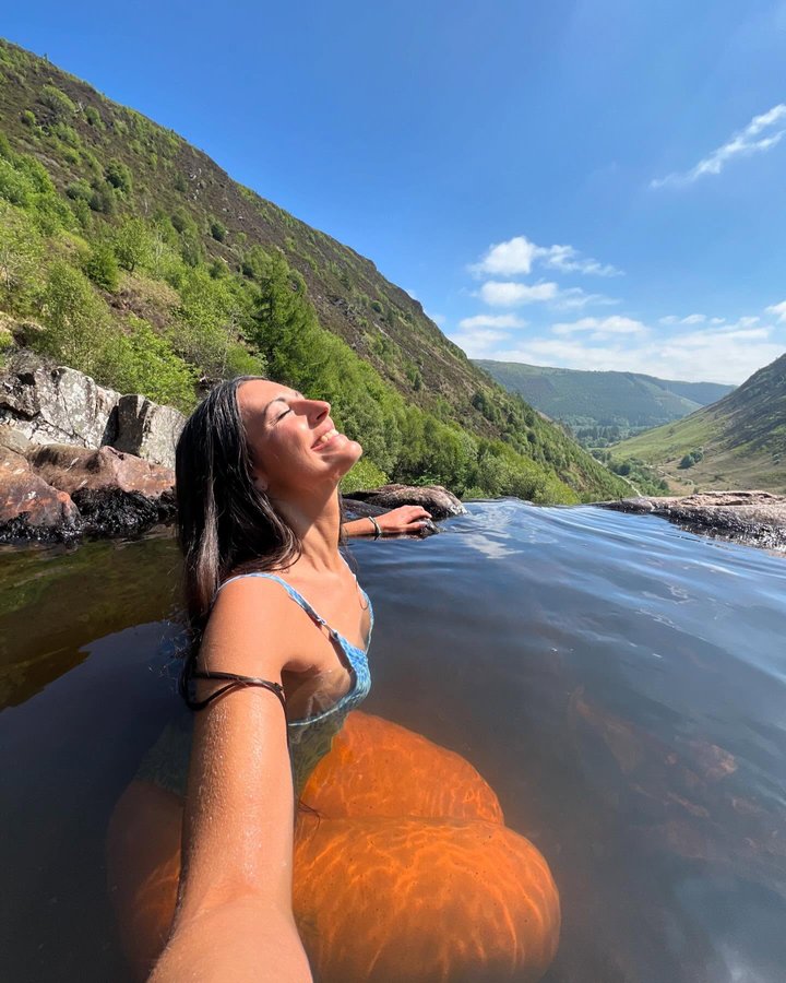 Instagram post by @wanderlustmary for OOSC Clothing. Caption reads: To go back to your favourite spot and dip until....