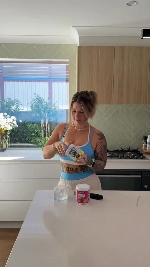 Instagram post by @_elliewilsonfitness__ for Muscle Nation. Caption reads: [...] flavour 🤤 ) Fit + supps are always....
