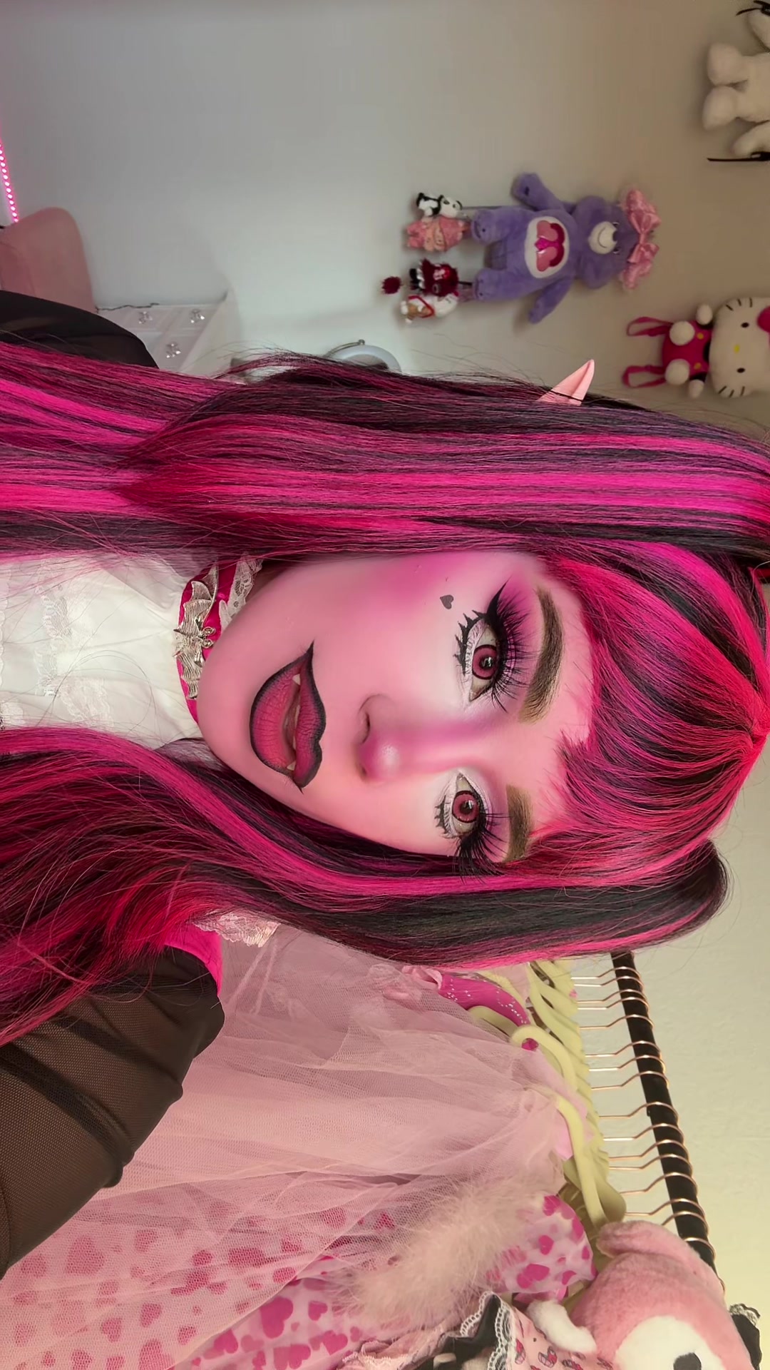TikTok post by @pinkpixieprincess for Dolls Kill. Caption reads: [...] for makeup tagged costume @Dolls Kill....