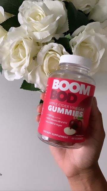 Instagram post by @tanice___amira for BOOMBOD. Caption reads: #ad Watch til the end 🤣 @boombod ACV gummies are....
