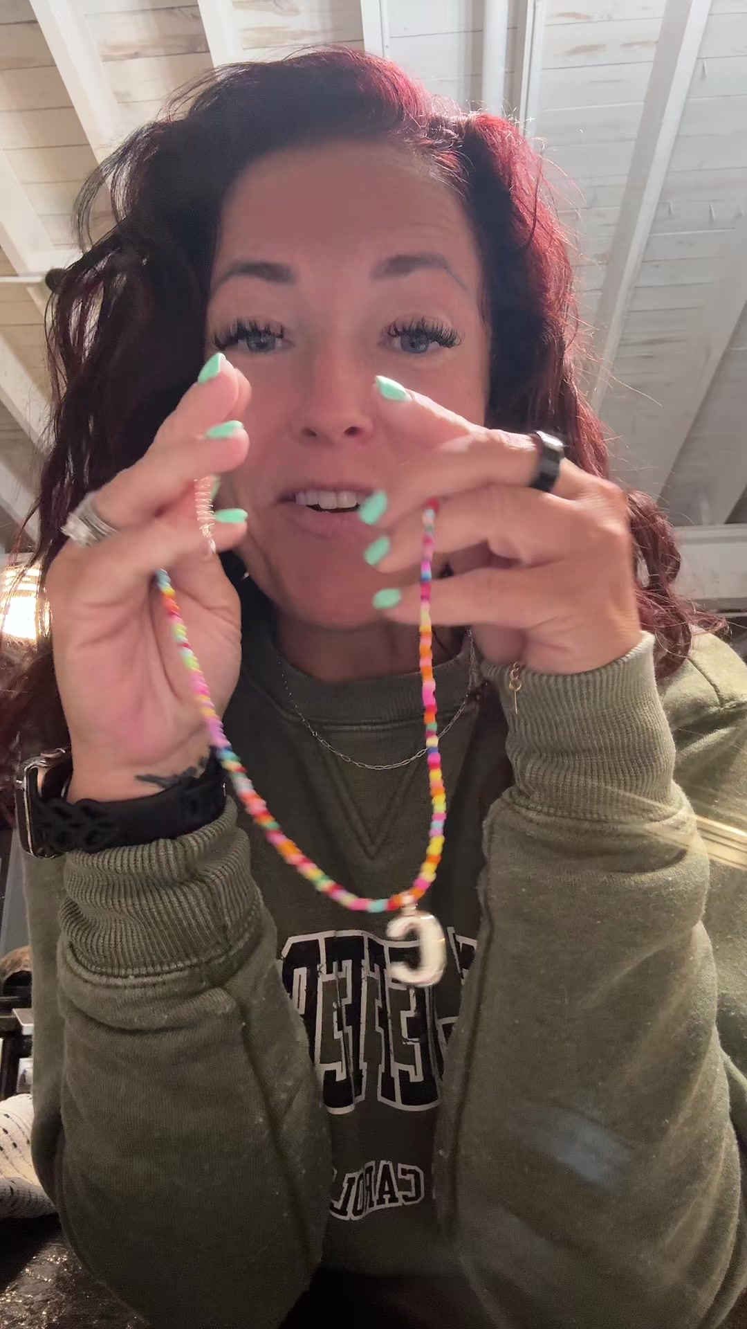 TikTok post by @tateandbooneco for VRIUA US. Caption reads: Add to cart!! @VRIUA US #initial #necklace....