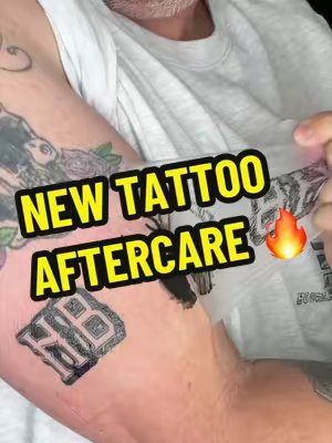 TikTok post by @kid.at.heart1973 for Mad Rabbit. Caption reads: My new tattoo aftercare routine @Mad Rabbit....