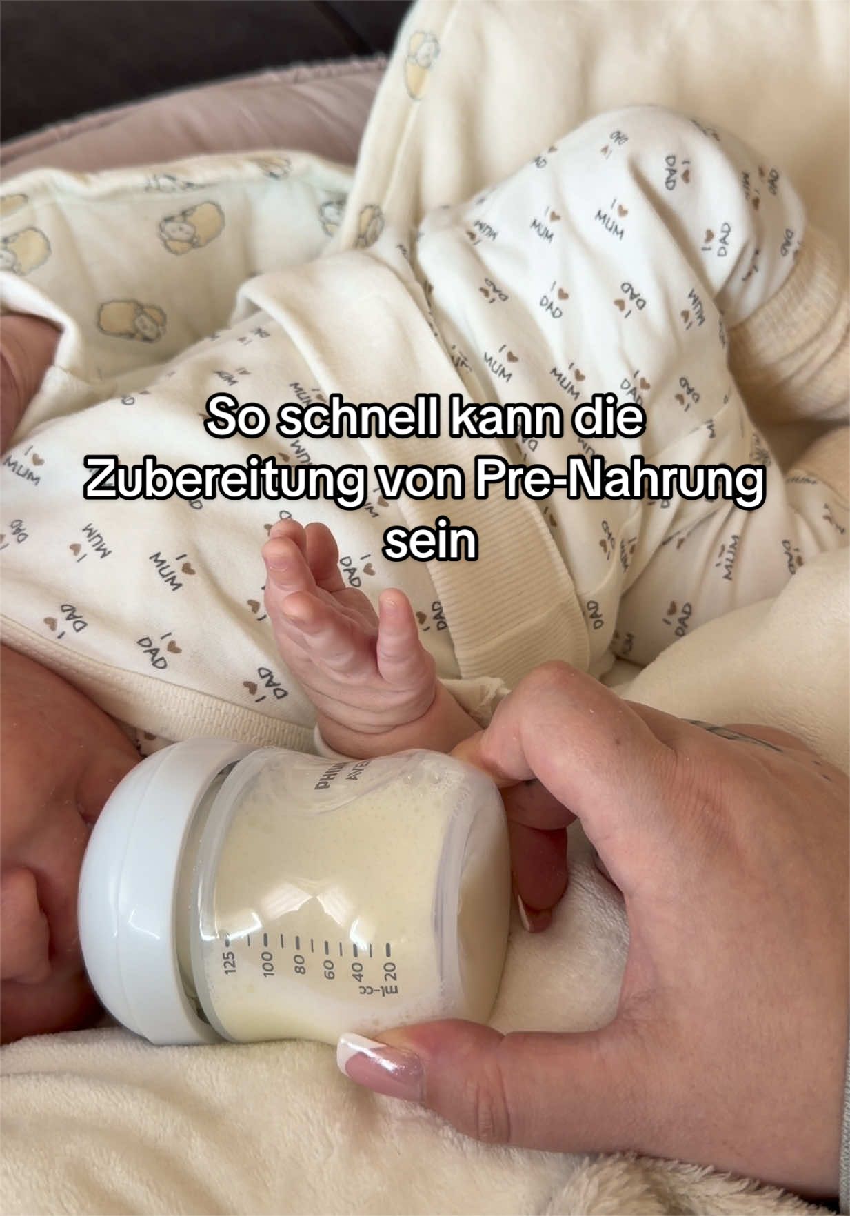 TikTok post by @buluts.welt for Momcozy. Caption reads: [...] !! #firsttimemom #boymom @Momcozy_DE....