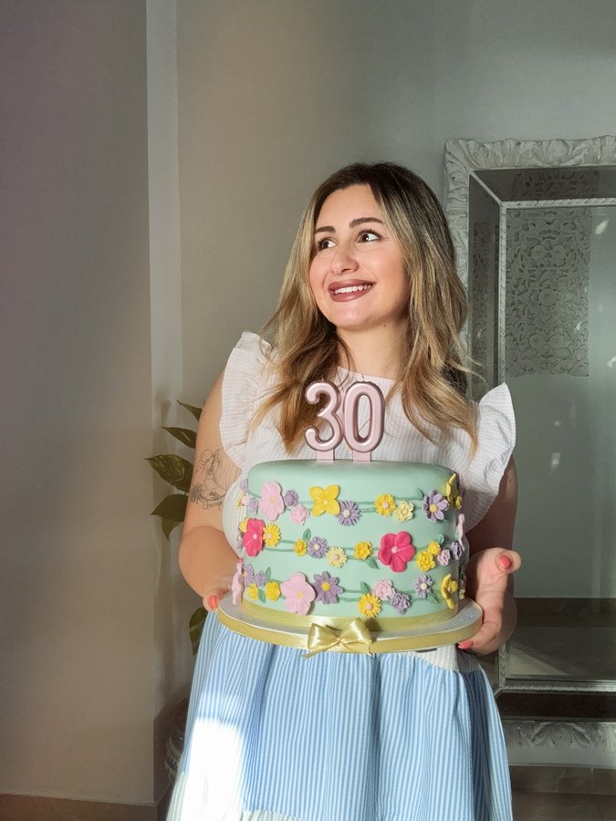 Instagram post by @steph95__x for Carisma Collections. Caption reads: 1995 girly turned thirty, flirty & thriving 🥂🎂....