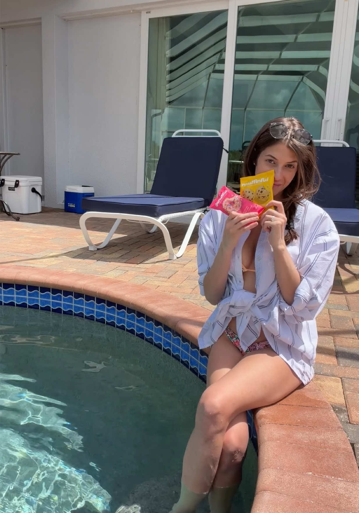 TikTok post by @thisisemme for Donutful. Caption reads: Pool day plus a @Bakeful Eats sweet treat is peak....