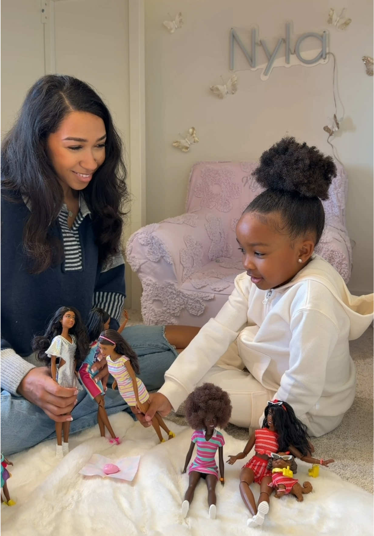 TikTok post by @jaylabrenae5 for Barbie. Caption reads: [...] loves seeing a reflection of herself in....