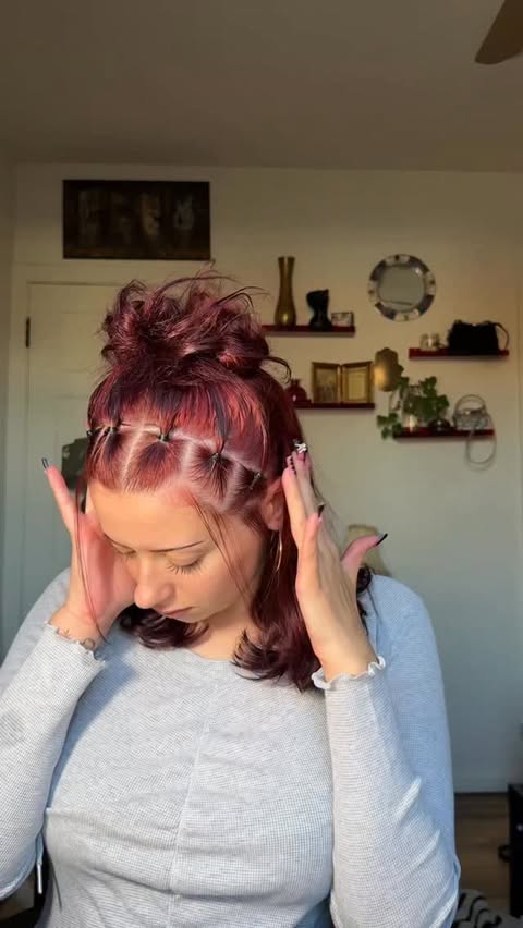 Instagram post by @gabbymckenzi for Sebastian Professional. Caption reads: Y2K half up half down hair tutorial featuring the....