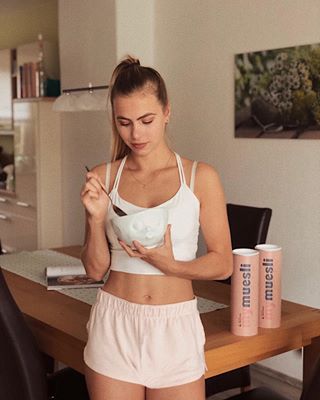 Instagram post by @darkredgrape for mymuesli. Caption reads: enjoying the last days at home before heading to....