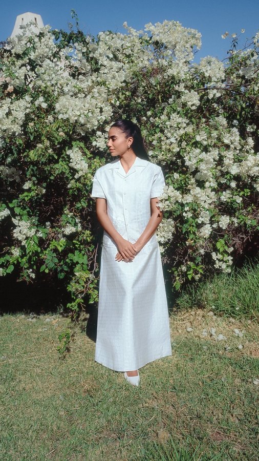 Instagram post by @natashaaris for FARFETCH. Caption reads: Family iftar in my favorite look from @farfetch....