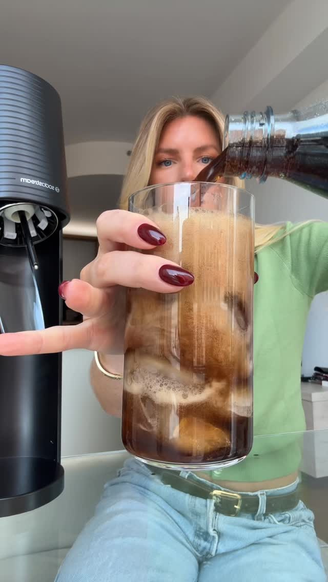 Instagram post by @daniellepheloung for SodaStream. Caption reads: Big fizz, big savings 💧🥤 Score your @sodastream....